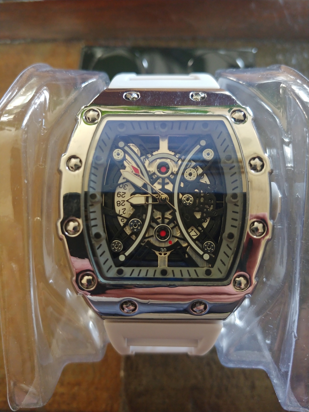 White and Silver Skeleton Sport Watch With Date.